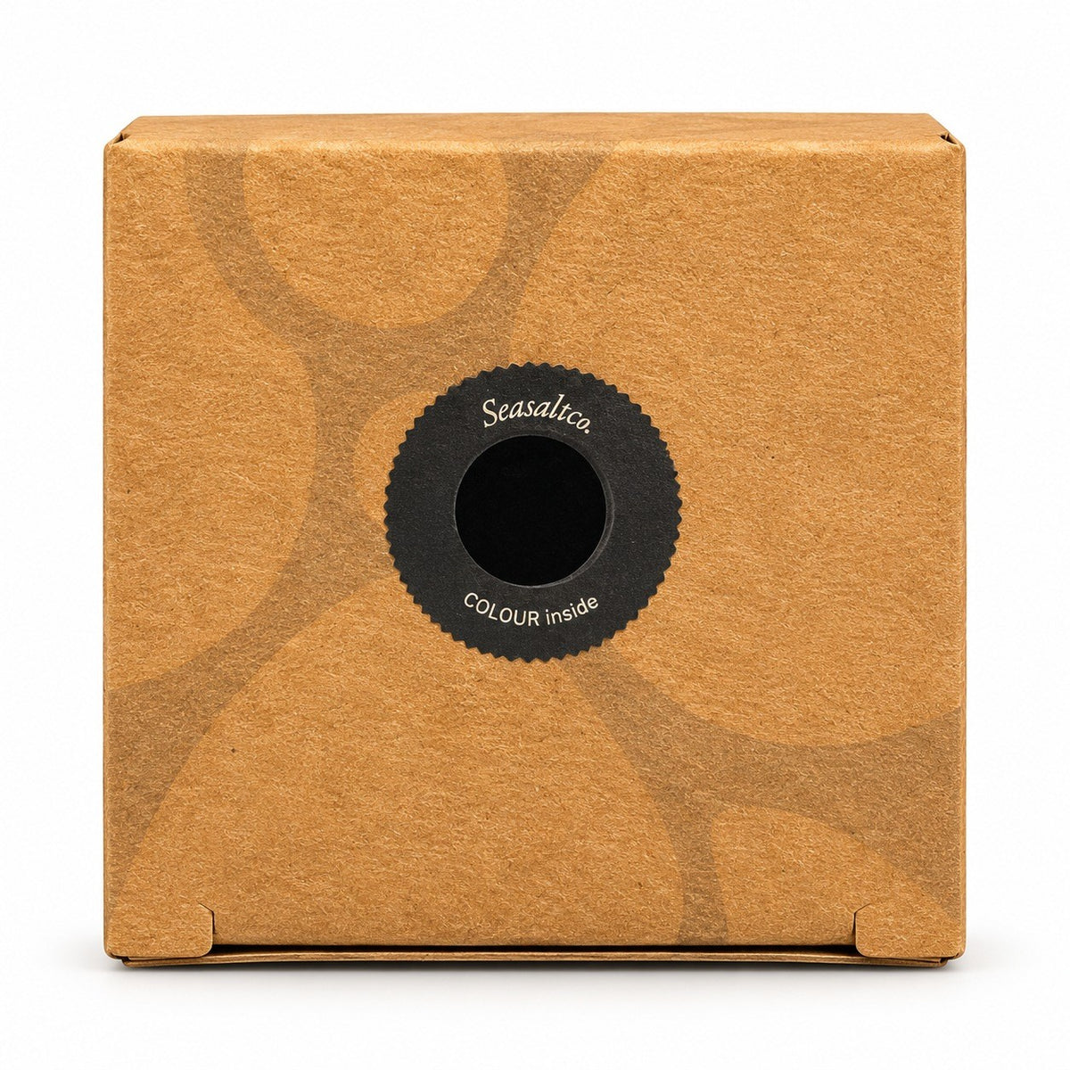 Seasaltco black hair powder in a square brown cardboard box with a circular label on the front.