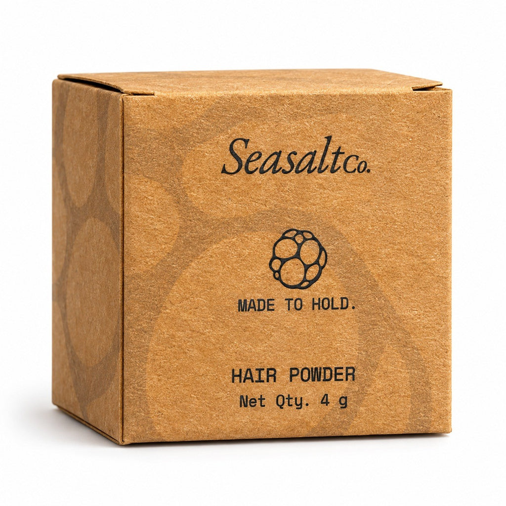 Seasaltco black hair powder in a small brown cardboard box with minimalist branding and 4g net quantity label.