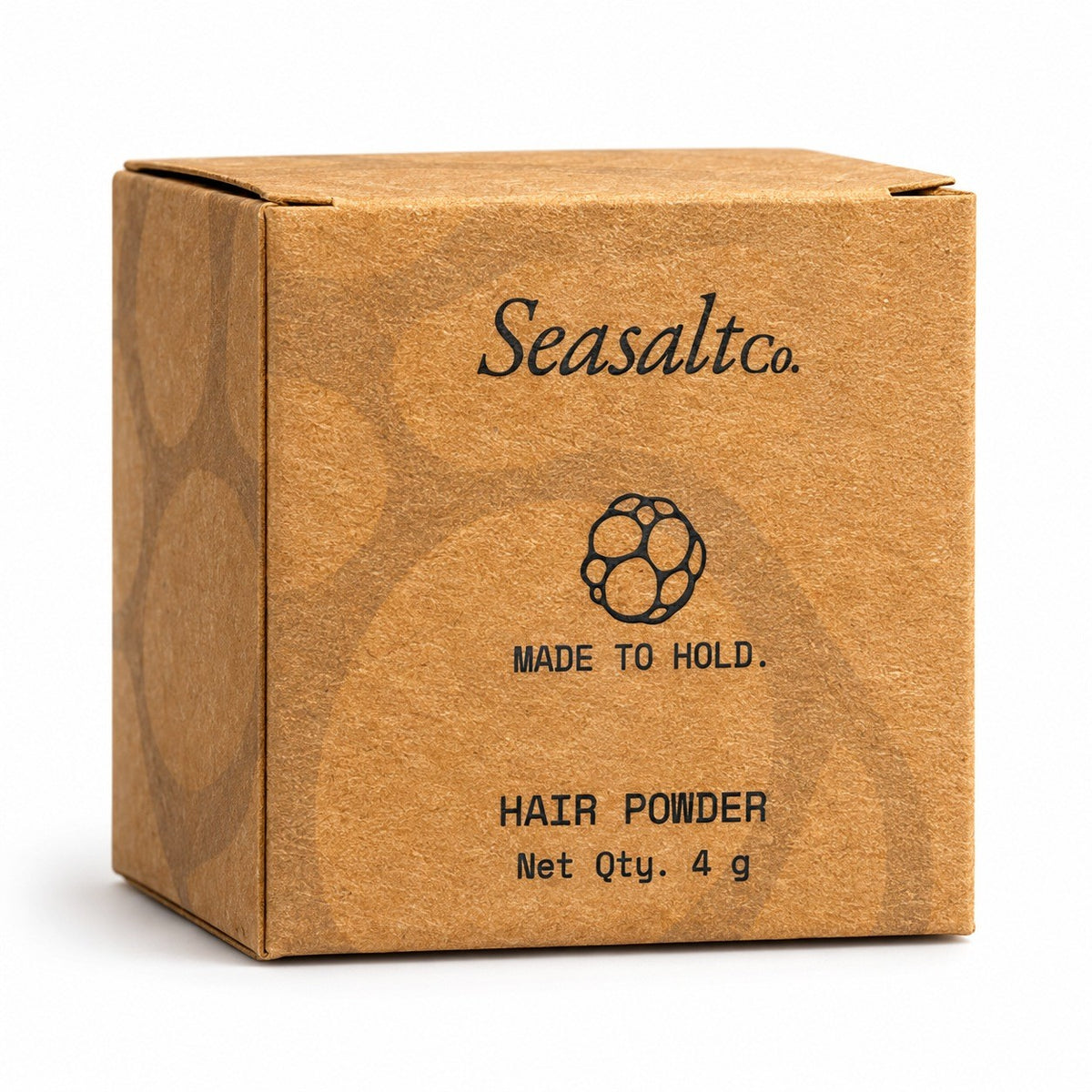 Seasaltco black hair powder in a small brown cardboard box with minimalist branding and 4g net quantity label.